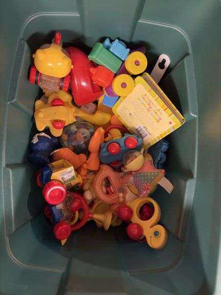 Tote of various toys from the 90's ish