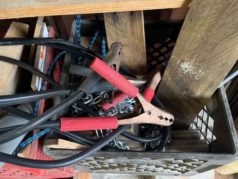 Pruning shears, metal plant holder, safety cone, wood pieces, boot jack, clothes hangers, etc