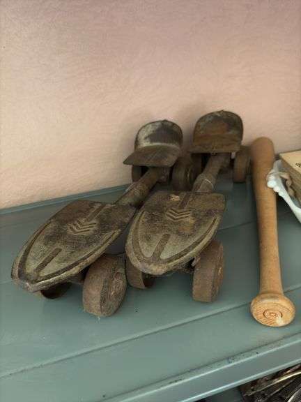 Old metal skates, alphabet cards, Bubba Bat Boy mini bat, rubber articulated construction vehicle