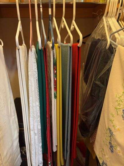 9 hangers of table linens