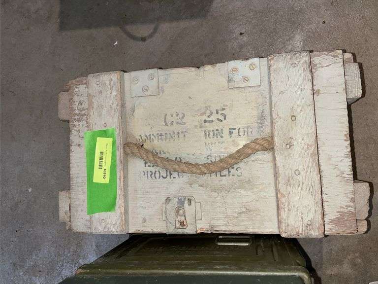 3 metal ammo boxes and 1 wood munitions box