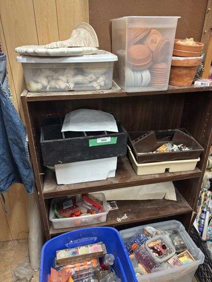 Bookshelf and craft items includes figurines to paint, large box of candles, lots of beads, terra-cotta pots