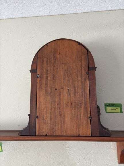 Antique walnut key wind shelf clock, very ornate carved case. Not sure if American or European ???