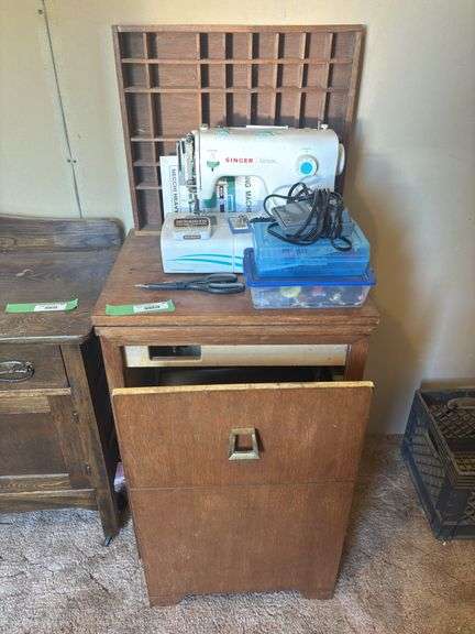 Singer sewing machine with fold out table and chair
