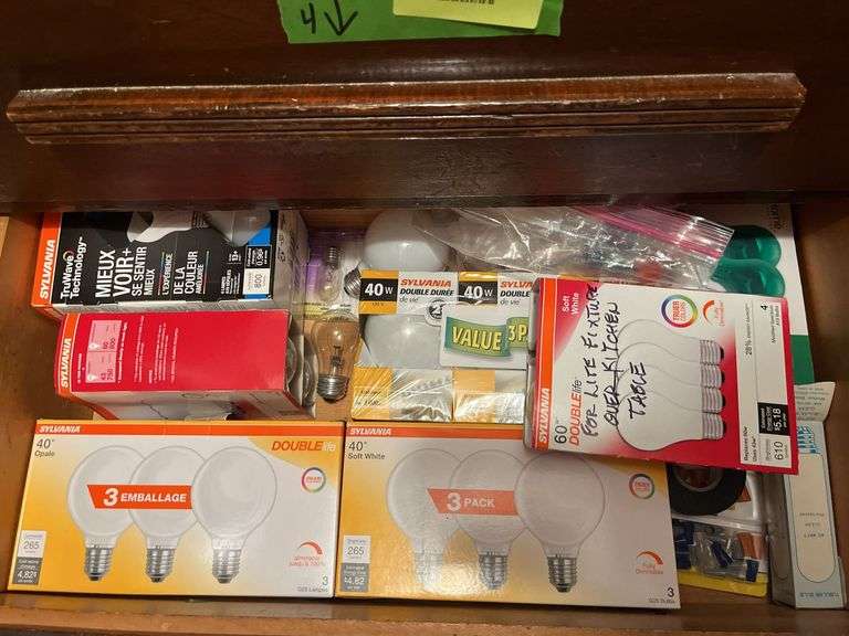 Four drawers of stuff includes extension cords and lots of light bulbs