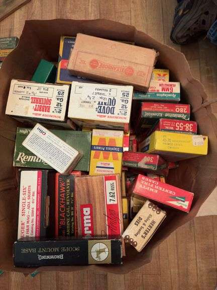 Grocery sack and box full of old cartridge boxes, most empty, some have hulls. Good man cave decor