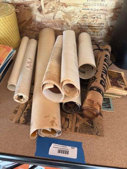 Antique and collectible paper goods, including prints, reward posters, black-and-white pictures