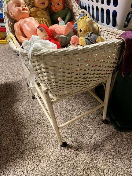 Old and older dolls, bassinet and stand