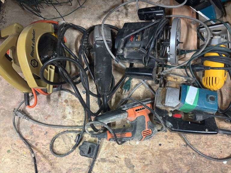 Eight corded hand tools, circular saw, sander, jigsaw, drill, router, wire brush
