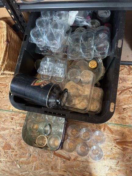 Large tote full of glass cups, and jars plus glass pie plates, and coffee mugs