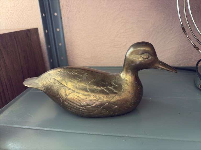Heavy brass duck