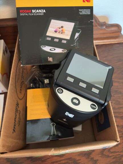 Kodak Easy Share camera C875, Kodak East Share camera Z1285 and Kodak Scanza digital film scanner