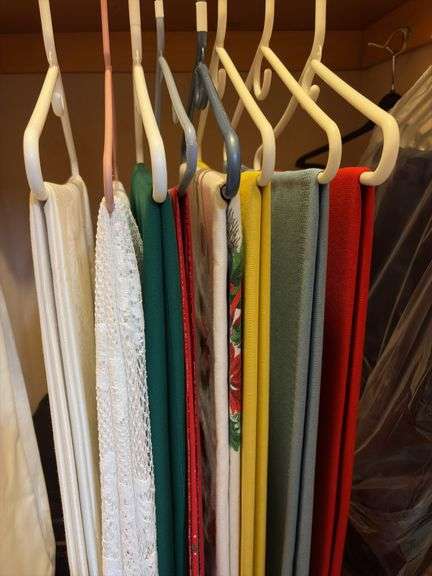9 hangers of table linens