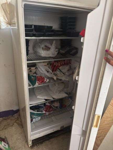 Kenmore upright freezer working and in use but does need a good cleaning