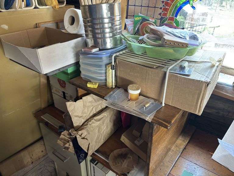 Desk, file cabinet and drawer full of stained glass making items