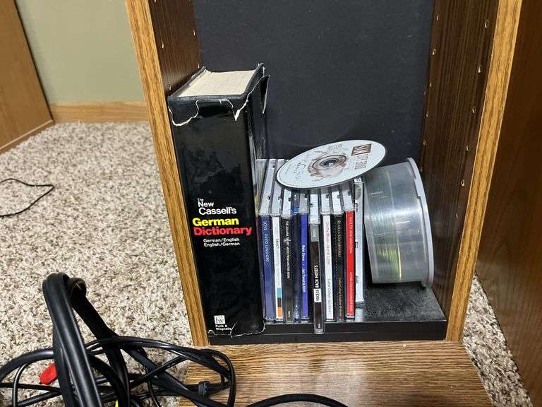 Panasonic DVD/CD player and CDs and storage tower