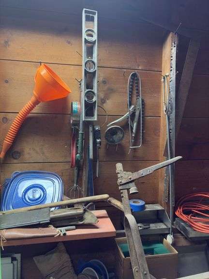 Tools etc as shown on right side of bench and wall