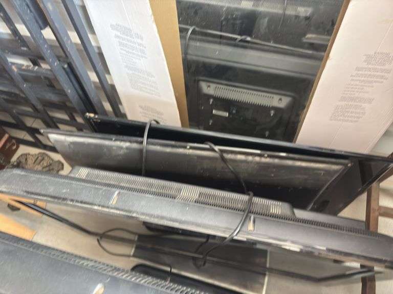 Four flatscreen TVs, all unknown condition, unknown status of remotes