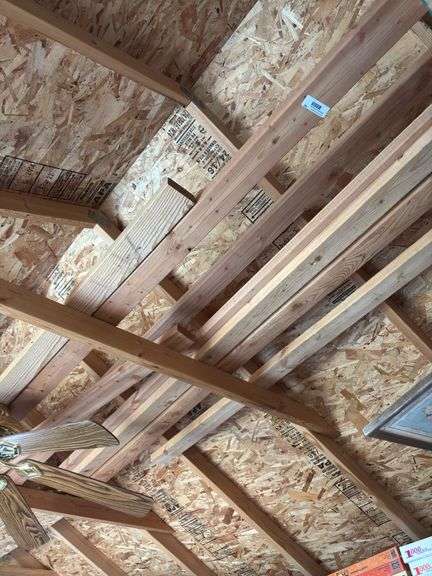 Two by fours in rafters of shed