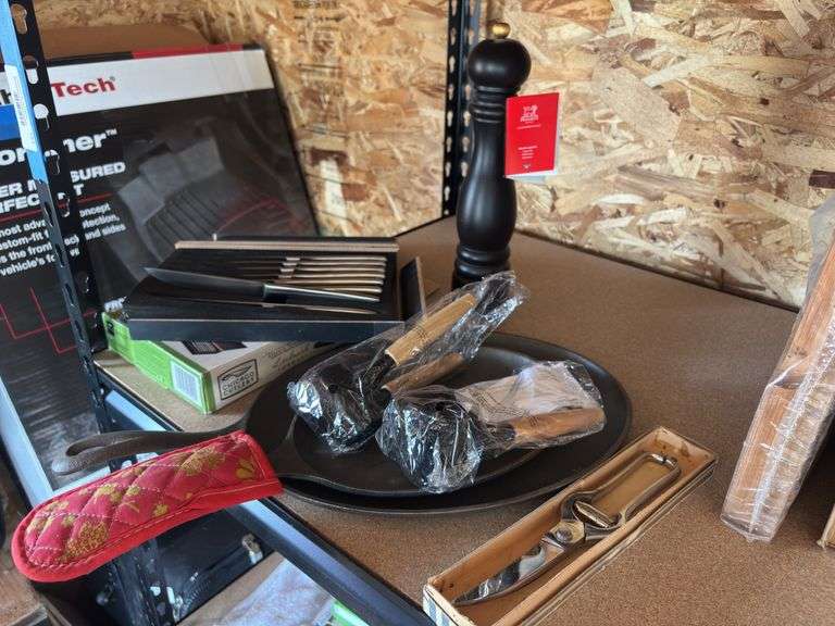 Cast-iron skillet, Chicago cutlery steak knives, pepper grinder, kitchen shears, and nutcracker
