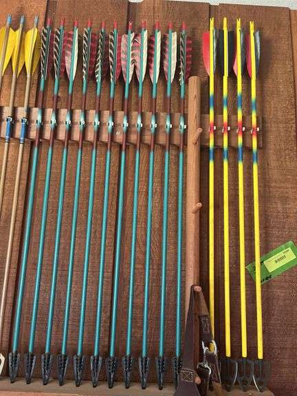 36 +/- mostly wood shaft traditional arrows and large quiver