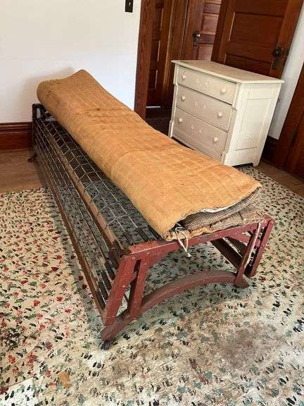 Twin size to full size spring bed on wheels with topper