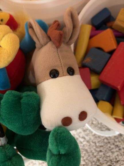 Duplo large Lego blocks, bucket of stuffed animals, bucket of wooden blocks