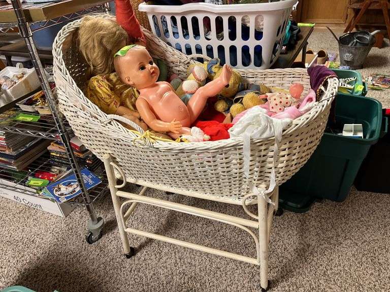 Old and older dolls, bassinet and stand