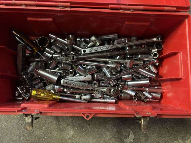 Red toolbox with tools