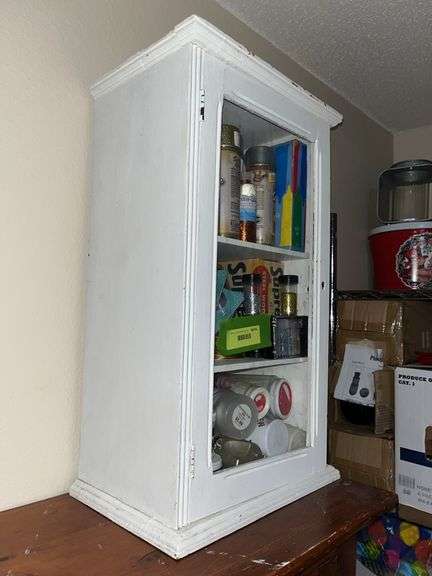 10D x 14L x 24H old wooden cabinet full of paints, glitter, etc...