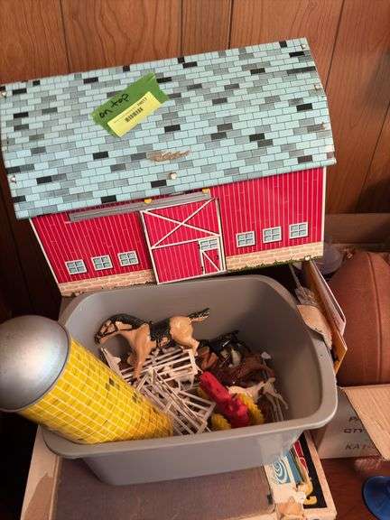 Children’s toys include board games, wooden dominoes, football, ball glove, Sunnyfield Farms barn and more