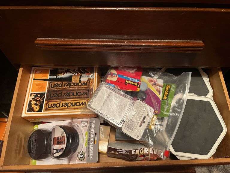 Four drawers of stuff includes extension cords and lots of light bulbs