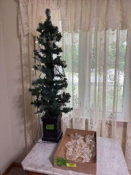 Glass tree ornaments and artificial tree w/ more ornaments