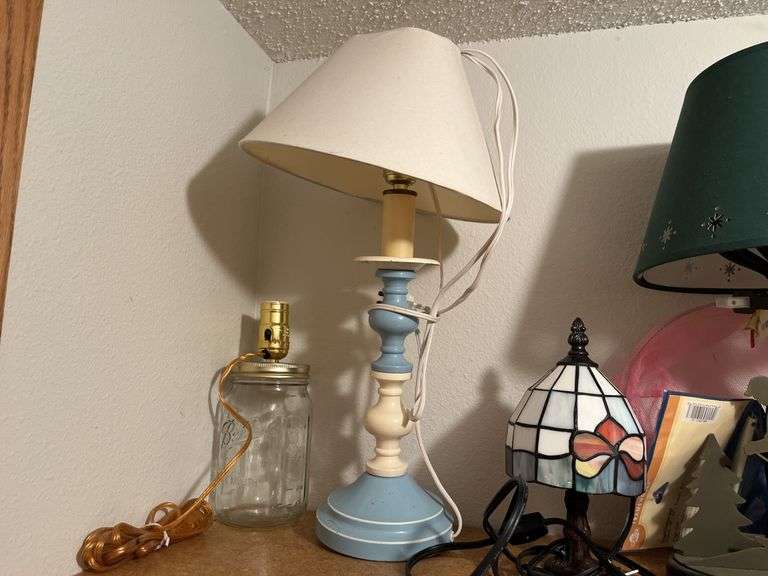 Five table lamps with winter themed base and three others