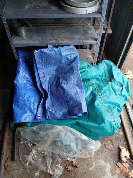 3 metal shelf units all are different sizes and some poly tarps, NO CONTENTS