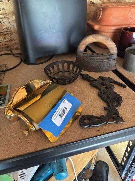 Cast iron wall bracket for kerosene lamp, brass toilet paper holder and sad iron