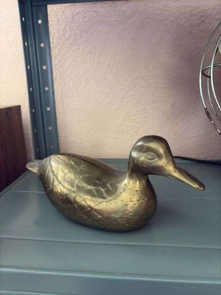 Heavy brass duck