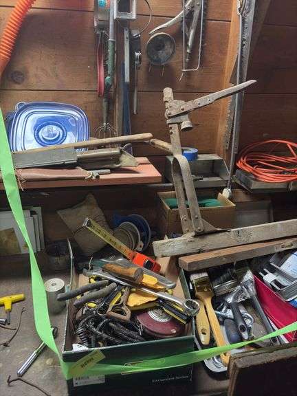 Tools etc as shown on right side of bench and wall