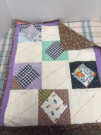 Wooden Dutch shoes and hand sewn doll quilt