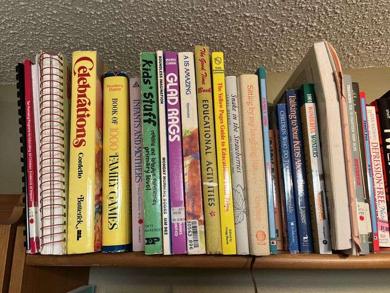 3 shelves of books and magazines Please see photos