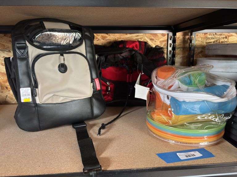 Two brand new picnic insulated cooler bags and a picnic set plastic brand new from Eddie Bauer