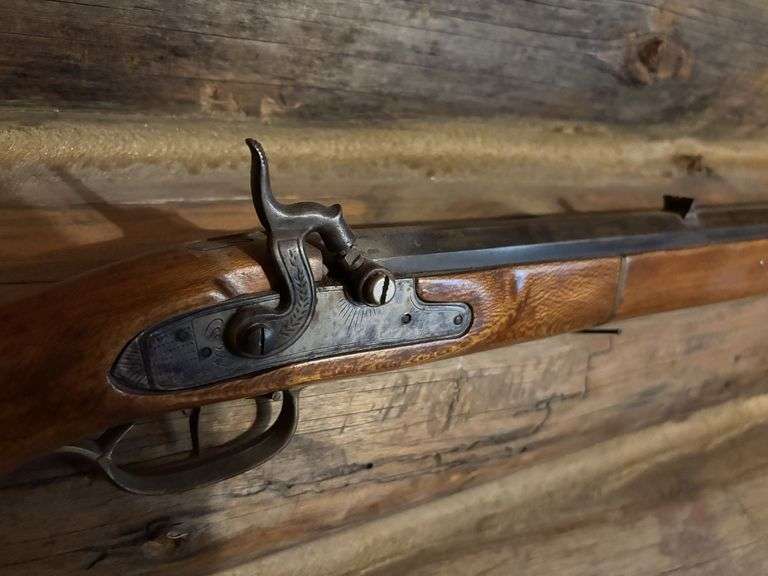 Connecticut Valley Arms Inc. Black powder rifle - has been used as a decorative wall hanger
