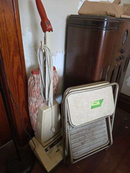 Upright vac, step stool and floor lamp