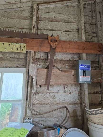Contents of tool shed includes tool boxes, 2 floor jacks, 2 man saw, windows, buckets of charcoal, nail kegs, nails, pony shoes and more See photos, bring your gloves!