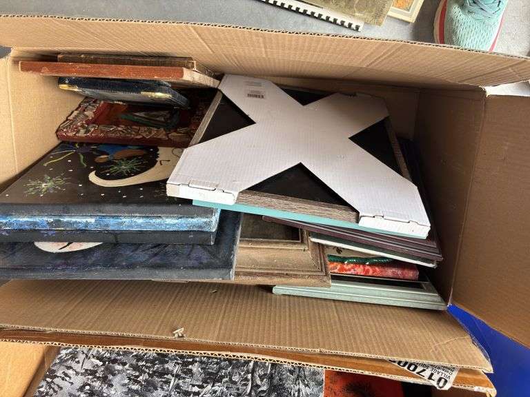 Two boxes of artwork