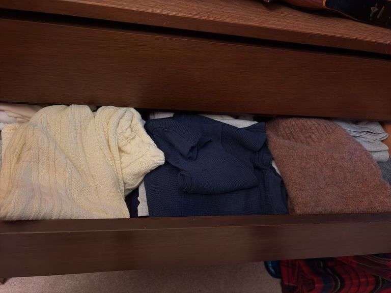 Contents of dresser includes various men’s shirts, sweaters and shoes All various sizes