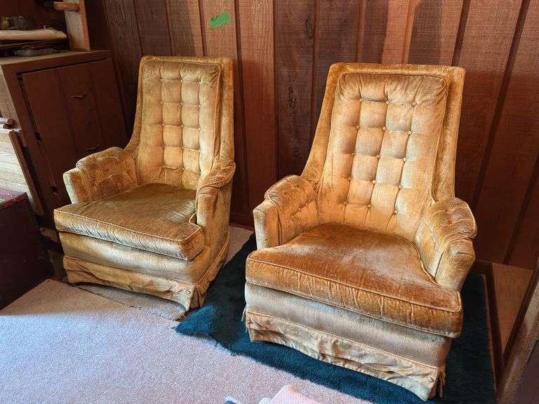 Pair of gold stationary chairs