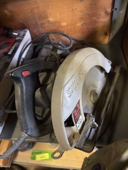 Shelf of various hand tools as shown