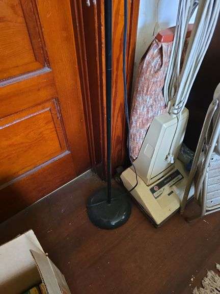 Upright vac, step stool and floor lamp