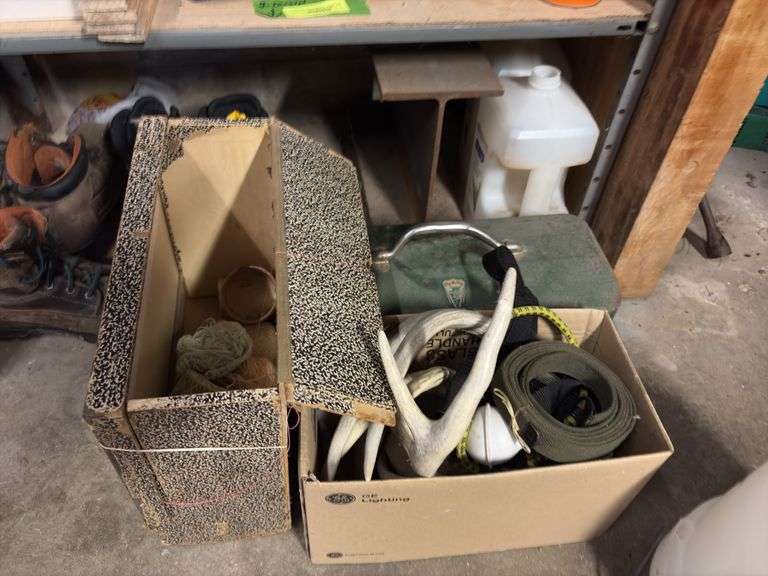 Bottom two shelves includes starting fluid, insect repellents, shoes, gloves, etc